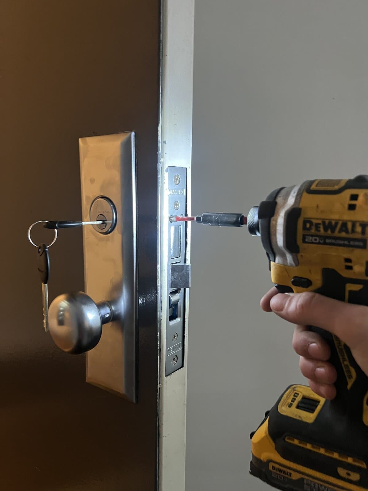 Threaded mortise cylinder being installed into an existing lock case